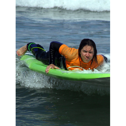 For decades Amy said that she wished she’d learned how to surf when we lived in California. So for a gift in 2013, I arranged for her to take a surf trip to San Diego with her sisters. She was really nervous! Then she found out she loved it. The next year, she talked some of her girlfriends into going back to surf school with her again Amy's Scrapbook: Surf Camp