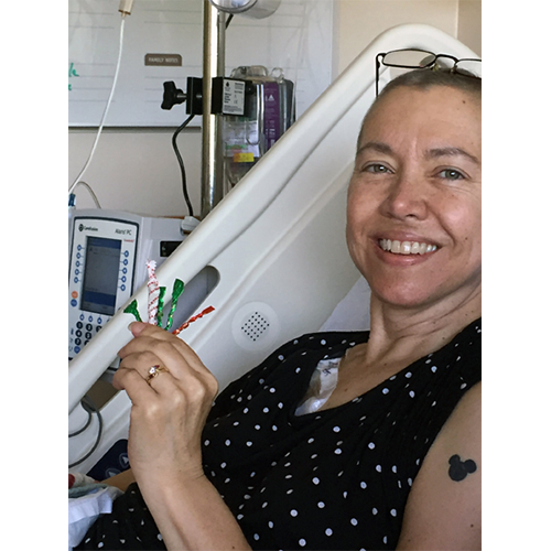 One day in Hospice, near the end, Amy was bored so she started making crafts out of candy wrappers for her sister, Jody. As they laughed, they quizzed themselves on daily theme songs from the 1950s show, The Mickey Mouse Club. In that happy moment, Jody snapped this picture on her cell. It was the last photo ever taken of Amy. Amy's Scrapbook: Last photo of Amy Nappa